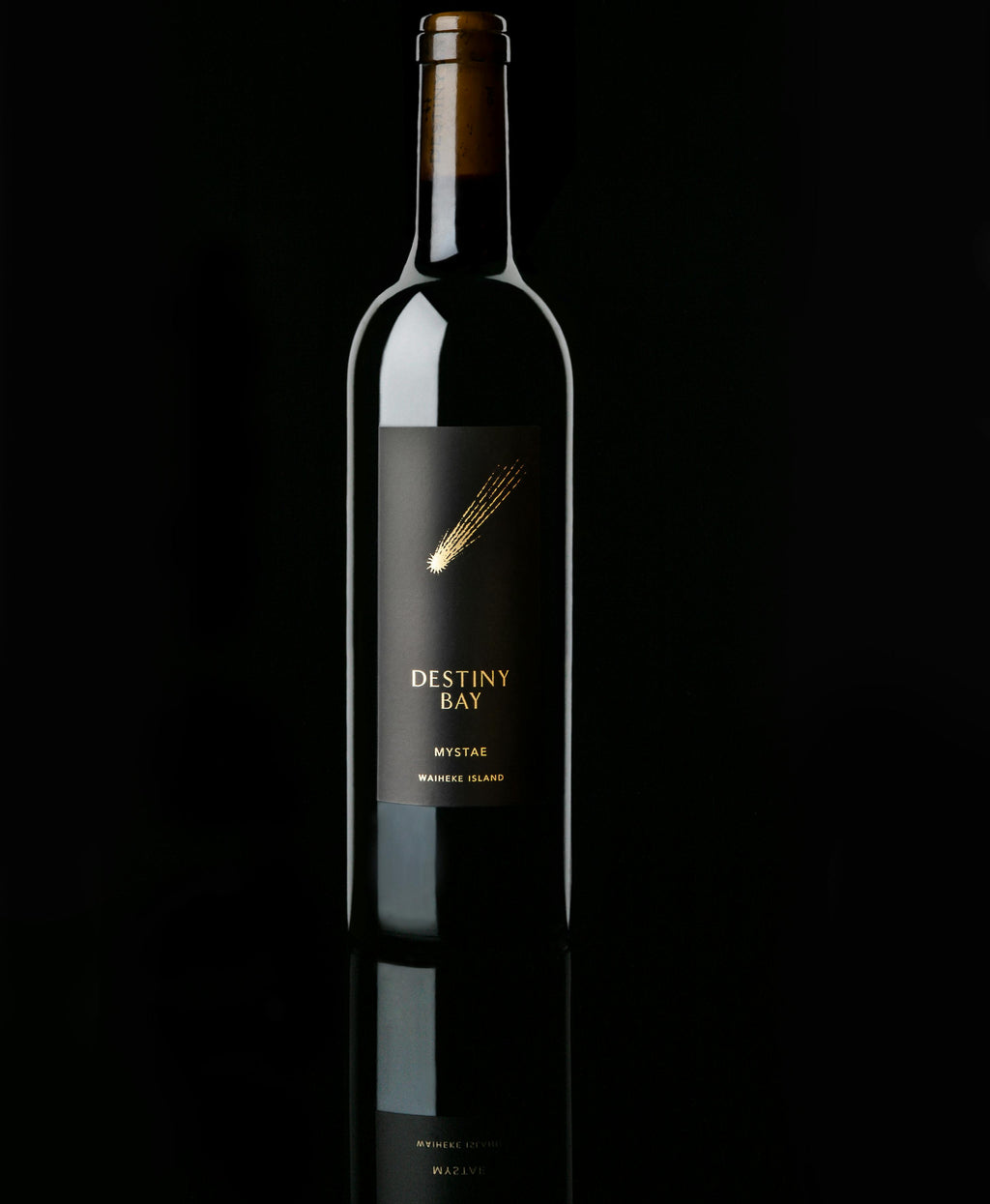Wine bottle with 'Destiny Bay' label on a black background